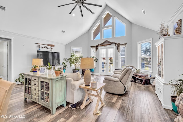 living room featuring ceiling fan, high vaulted ceiling, french doors, and hardwood / wood-style floors