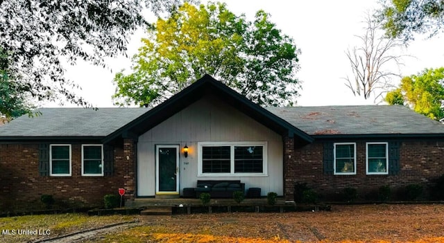 ranch-style home with brick siding