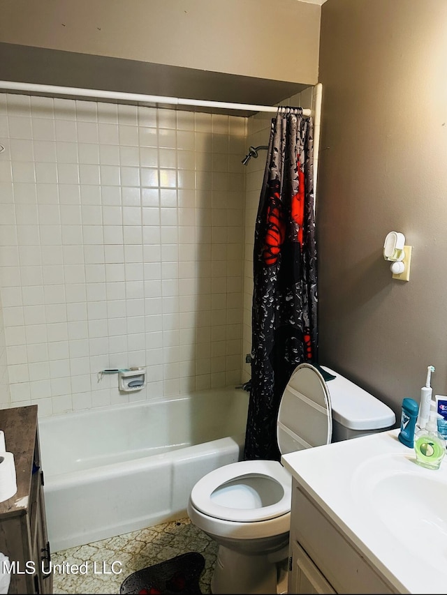 full bathroom featuring vanity, toilet, and shower / tub combo with curtain