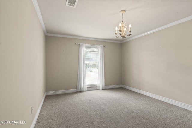 spare room with baseboards, visible vents, a notable chandelier, crown molding, and carpet flooring