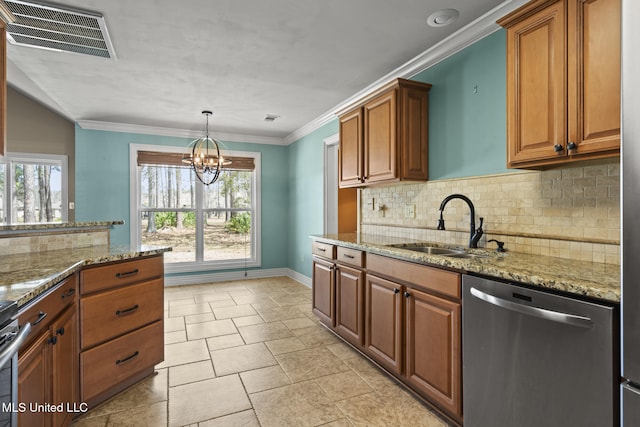 kitchen with visible vents, a sink, stainless steel dishwasher, a notable chandelier, and brown cabinets