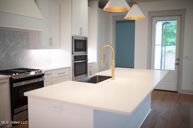 256 Arbor Trl, Brandon, MS 39047 - kitchen featuring stainless steel appliances, a sink, exhaust hood, decorative backsplash, and white cabinets