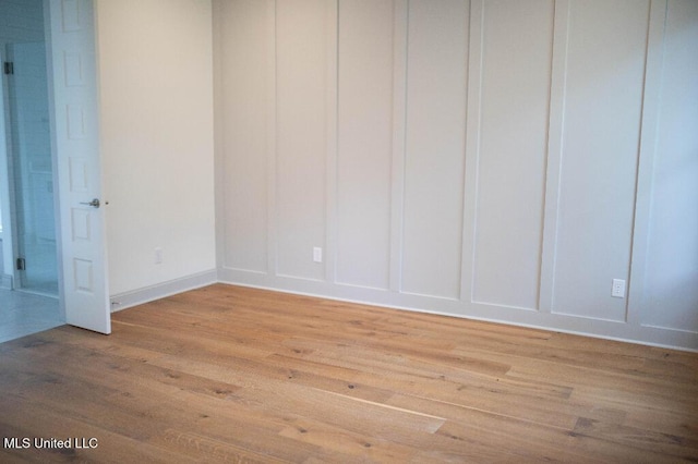 256 Arbor Trl, Brandon, MS 39047 - spare room with light wood-style floors and baseboards