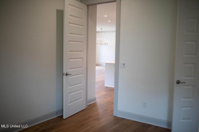 256 Arbor Trl, Brandon, MS 39047 - empty room with a chandelier, wood finished floors, baseboards, and recessed lighting