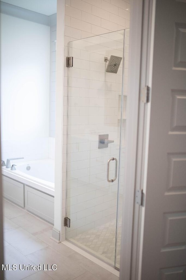 256 Arbor Trl, Brandon, MS 39047 - bathroom with a stall shower and a garden tub