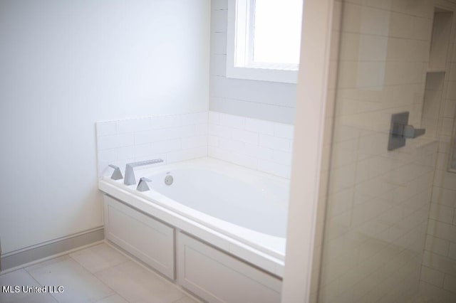 256 Arbor Trl, Brandon, MS 39047 - full bath with a garden tub, a stall shower, and tile patterned flooring