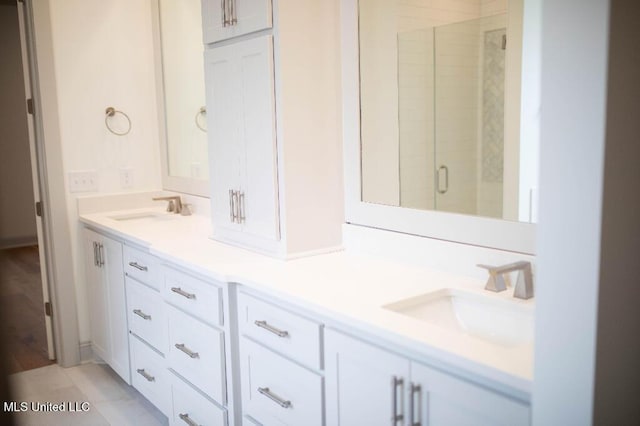 256 Arbor Trl, Brandon, MS 39047 - bathroom with a stall shower and double vanity