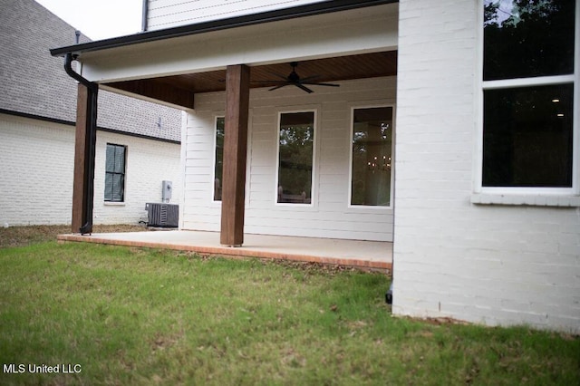 256 Arbor Trl, Brandon, MS 39047 - rear view of house with a ceiling fan, a patio, a lawn, and central AC