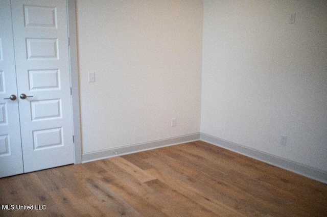 256 Arbor Trl, Brandon, MS 39047 - spare room featuring wood finished floors and baseboards