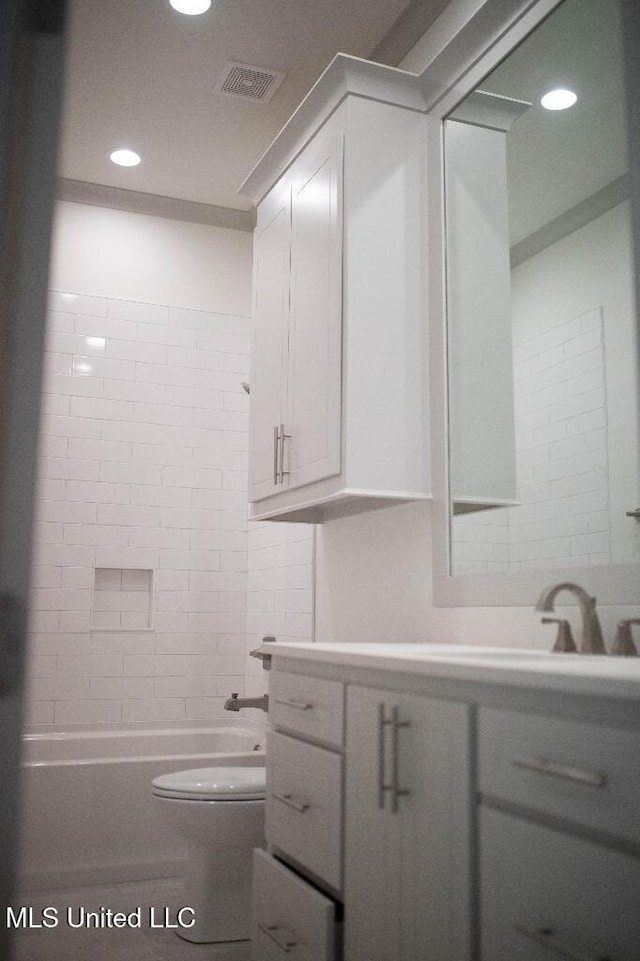 256 Arbor Trl, Brandon, MS 39047 - bathroom featuring vanity, toilet, recessed lighting, and  shower combination