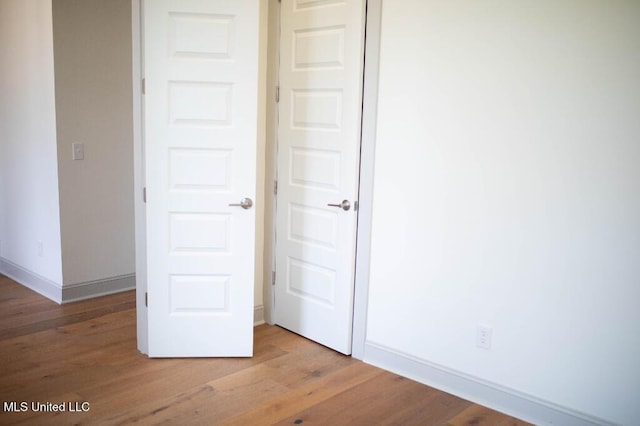 256 Arbor Trl, Brandon, MS 39047 - unfurnished bedroom with light wood-type flooring, baseboards, and a closet