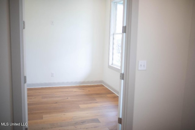 256 Arbor Trl, Brandon, MS 39047 - spare room featuring wood finished floors and baseboards