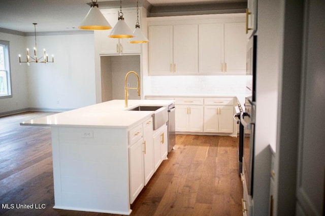 256 Arbor Trl, Brandon, MS 39047 - kitchen with a sink, wood finished floors, a chandelier, dishwasher, and white cabinets