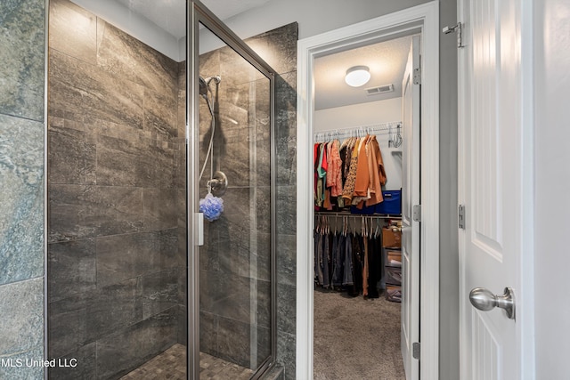 275 Magnolia Gardens Dr, Hernando, MS 38632 - full bathroom featuring a stall shower and a walk in closet