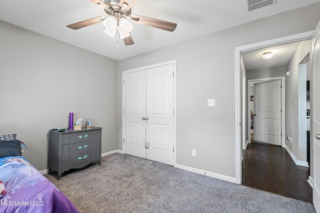 275 Magnolia Gardens Dr, Hernando, MS 38632 - bedroom with carpet, a closet, and a ceiling fan