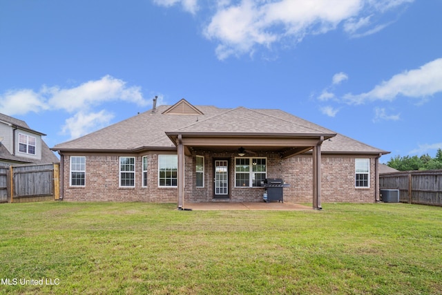 275 Magnolia Gardens Dr, Hernando, MS 38632 - rear view of property featuring a ceiling fan, brick siding, a patio, a fenced backyard, and roof with shingles