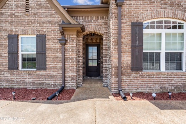 275 Magnolia Gardens Dr, Hernando, MS 38632 - doorway to property with brick siding