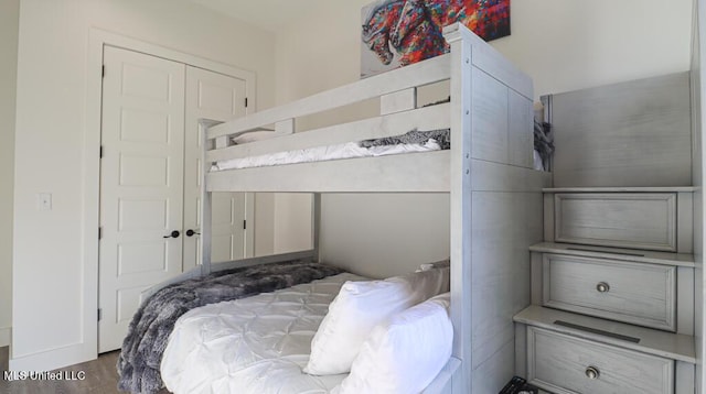 bedroom with wood-type flooring