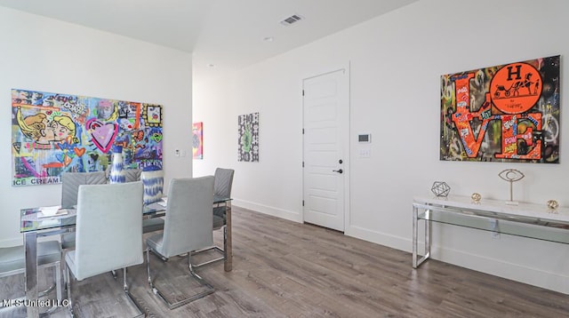 dining area featuring hardwood / wood-style floors