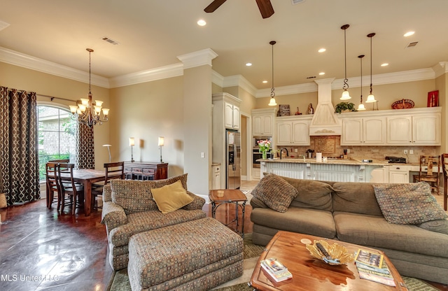 living room with ornamental molding, ceiling fan with notable chandelier, recessed lighting, and visible vents