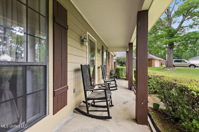 view of patio featuring a porch