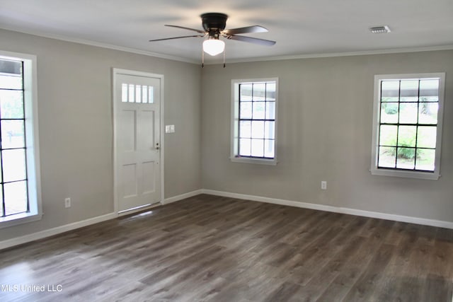 foyer featuring crown molding, ceiling fan, and dark hardwood / wood-style flooring