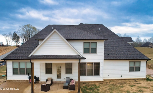 rear view of property with a patio area