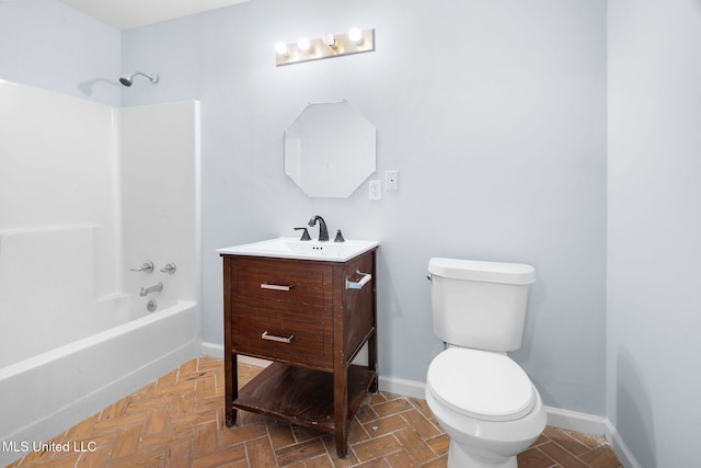 bathroom featuring shower / tub combination, baseboards, toilet, and vanity