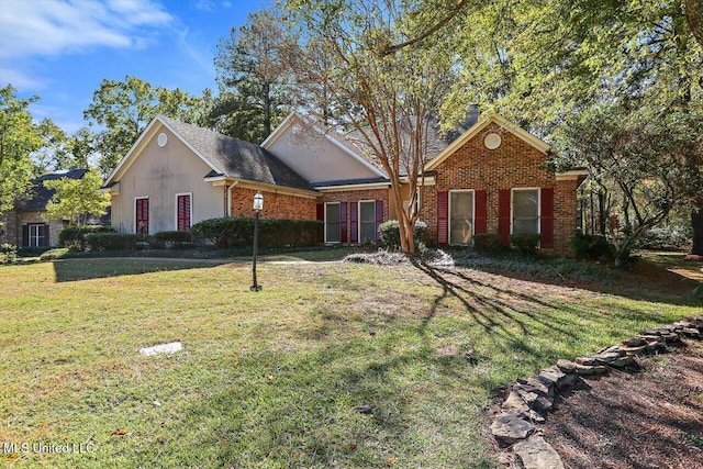 view of front of home with a front lawn