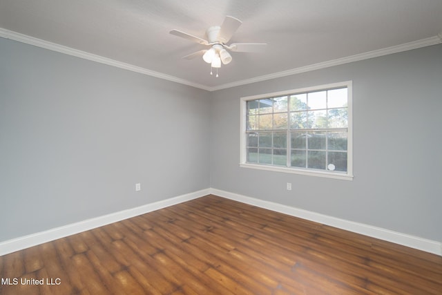 unfurnished room featuring a ceiling fan, crown molding, baseboards, and wood finished floors