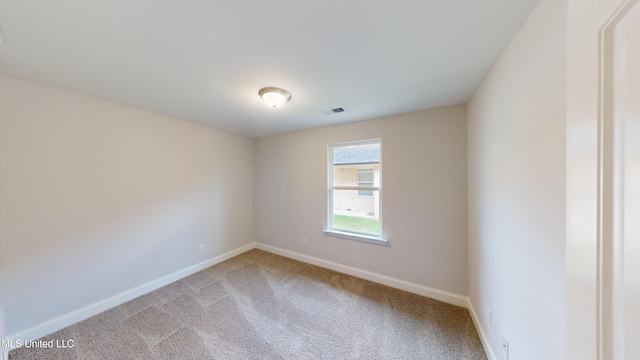 unfurnished room with carpet floors