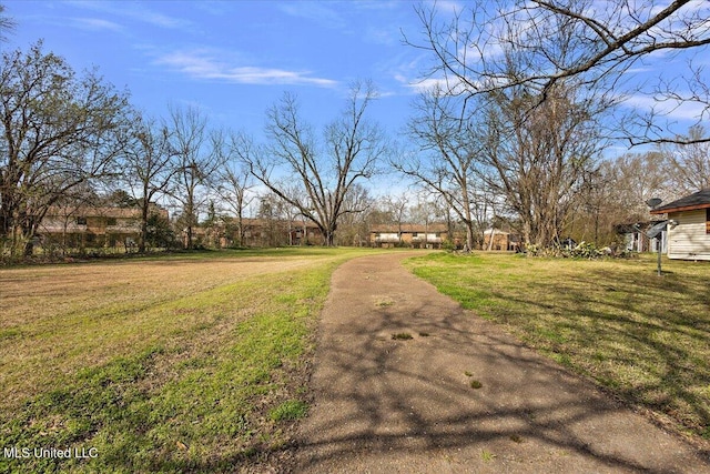 view of street with aphalt driveway