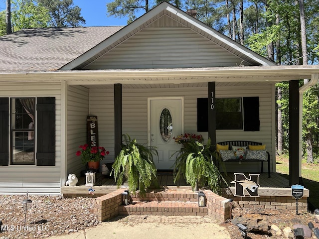 110 Hawks Nest Cv, Brandon, MS 39042 - view of front facade with covered porch and roof with shingles