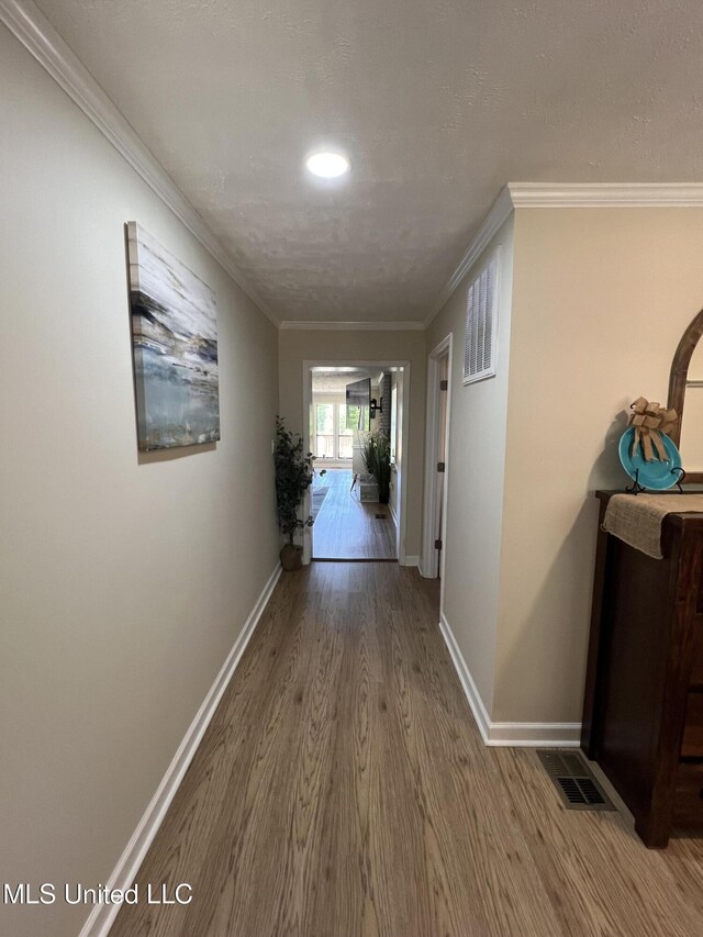 110 Hawks Nest Cv, Brandon, MS 39042 - hall with wood finished floors, crown molding, and recessed lighting