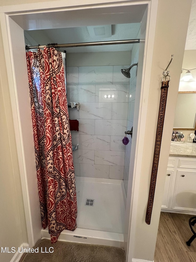 110 Hawks Nest Cv, Brandon, MS 39042 - full bath featuring a tile shower and vanity