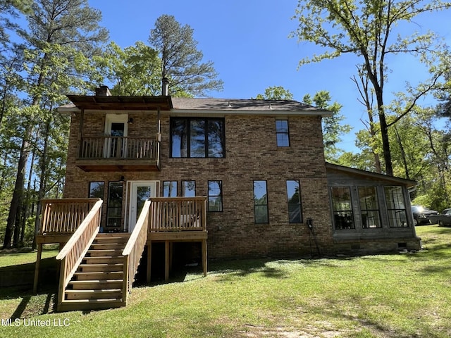 110 Hawks Nest Cv, Brandon, MS 39042 - rear view of property featuring a balcony, stairs, a lawn, and brick siding