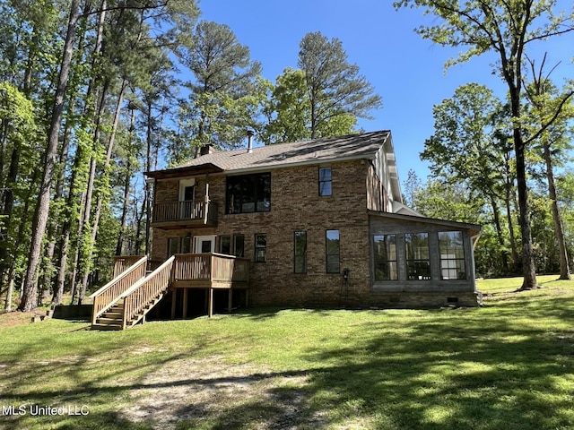 110 Hawks Nest Cv, Brandon, MS 39042 - back of property featuring a balcony, a yard, and stairway