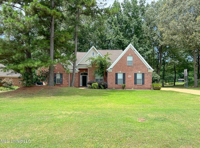 view of front of home featuring a front yard