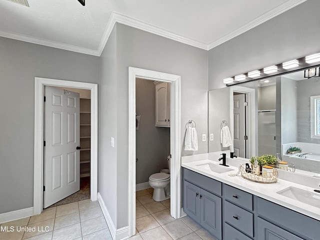 full bathroom with tile patterned flooring, separate shower and tub, crown molding, toilet, and vanity