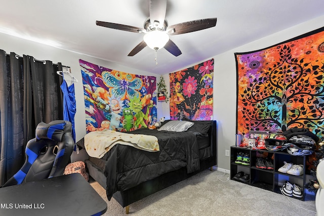 bedroom with ceiling fan and light carpet