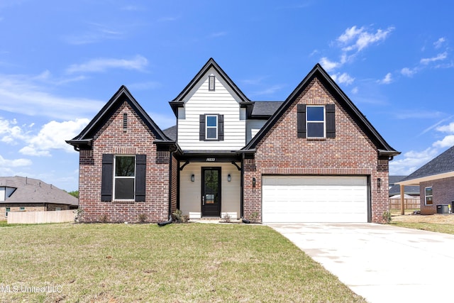 10243 March Meadows Way, Olive Branch, MS 38654 - view of front facade featuring brick siding, driveway, and an attached garage