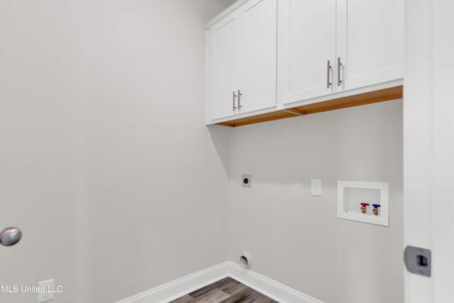 10243 March Meadows Way, Olive Branch, MS 38654 - washroom with cabinet space, baseboards, hookup for a washing machine, wood finished floors, and hookup for an electric dryer
