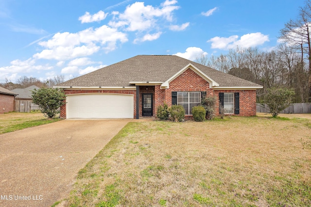 single story home featuring brick siding, driveway, a front lawn, and fence