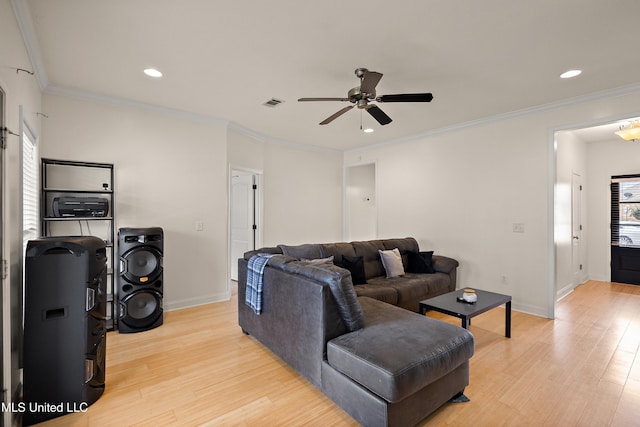 living room featuring visible vents, recessed lighting, light wood-type flooring, and baseboards