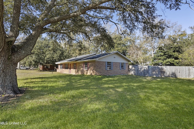 exterior space featuring a yard