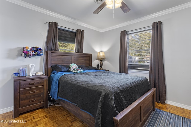 bedroom with dark parquet floors, ceiling fan, and crown molding