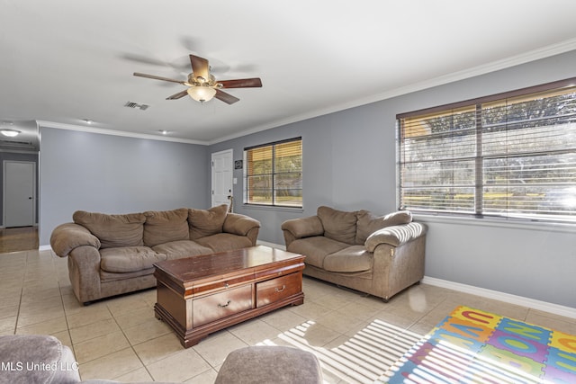 tiled living room featuring ceiling fan and ornamental molding