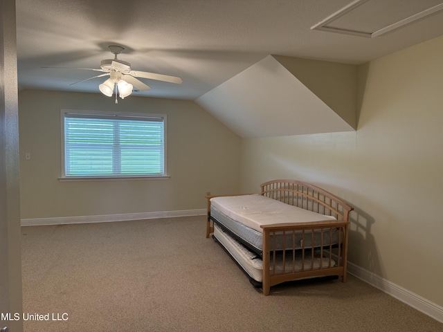 4013 Haiti St, Bay Saint Louis, MS 39520 - bedroom featuring ceiling fan, baseboards, carpet flooring, and vaulted ceiling