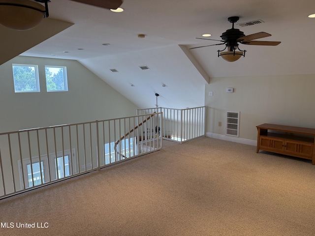4013 Haiti St, Bay Saint Louis, MS 39520 - additional living space featuring visible vents, recessed lighting, lofted ceiling, a ceiling fan, and carpet floors