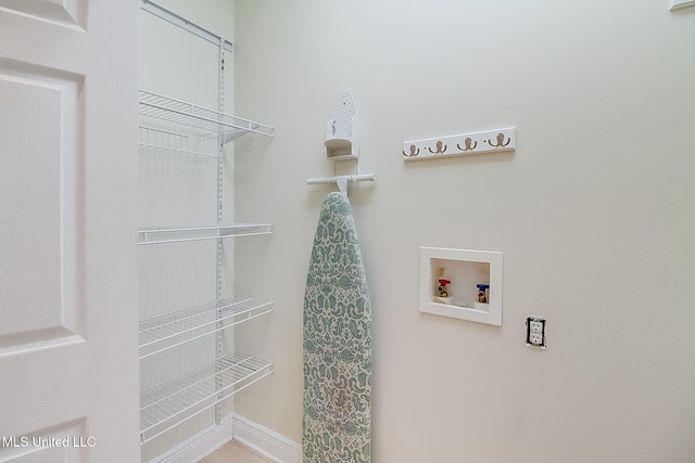 4013 Haiti St, Bay Saint Louis, MS 39520 - clothes washing area with washer hookup and baseboards